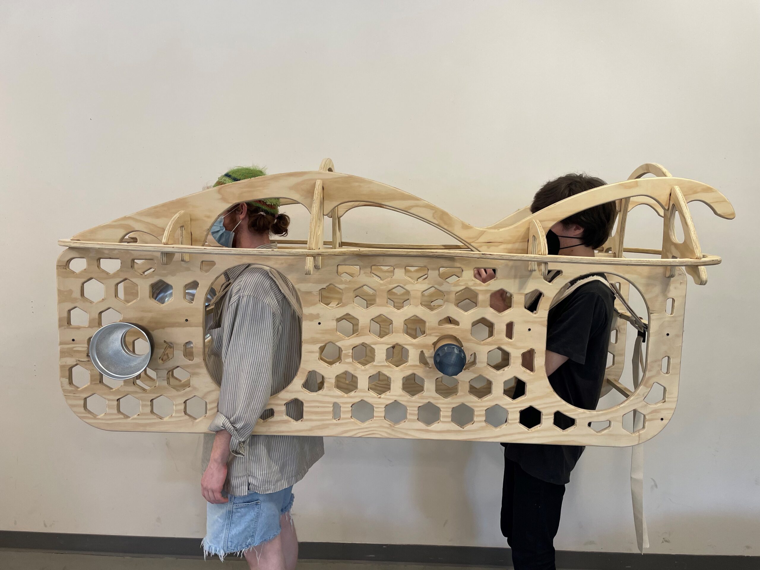 Image of me and my classmate, Jack, showing off a fully assembled chassis.